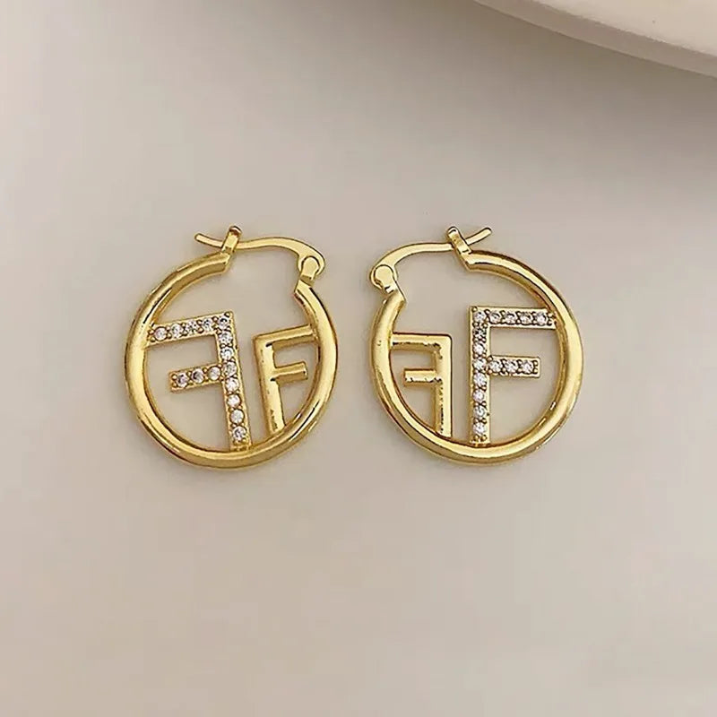 Full of zircon hollow circle letter F ear buckle personality fashion cold wind light luxury niche temperament earrings