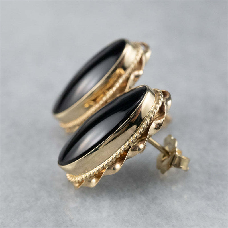 Elegant Oval Inlaid with Black Stones Stud Earrings for Women Fashion Gold Color Metal Carving Patterned Earrings