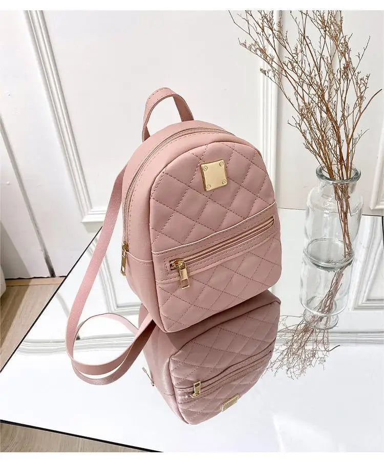 Embroidery small backpack ladies bags Korean version of the girls small schoolbag schoolbag one piece of foreign solid color lov